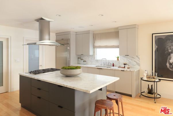 Interior, Kitchen, Marble Walls, Recessed Lighting, Stainless Steel Appliances, Wood Texture Flooring