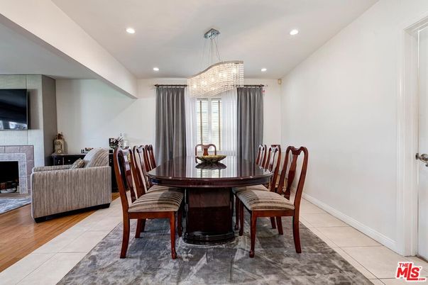 Chandelier, Dining room, Fireplace, Interior, Living room, Recessed Lighting, Wood Texture Flooring