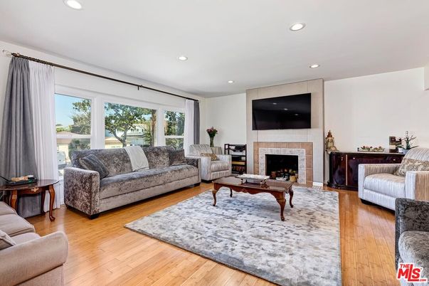 Fireplace, Interior, Living room, Recessed Lighting, Wood Texture Flooring