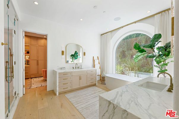 Bathroom, Dual Sink Vanities, Free Standing Baths, Interior, Recessed Lighting, Wood Texture Flooring
