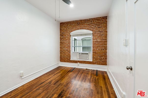 Empty room, Interior, Recessed Lighting, Stone Walls, Wood Texture Flooring