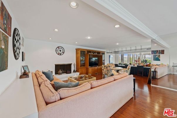 Dining room, Fireplace, Interior, Living room, Recessed Lighting, Wood Texture Flooring