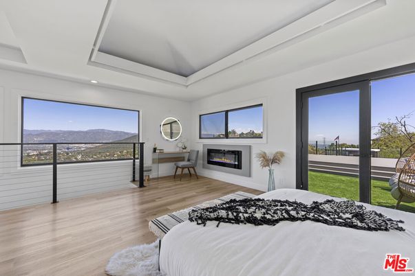 Bedroom, Fireplace, Interior, Recessed Lighting, Wood Texture Flooring