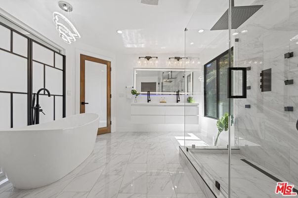 Bathroom, Dual Sink Vanities, Free Standing Baths, Glass Shower, Interior, Marble, Marble Walls, Recessed Lighting