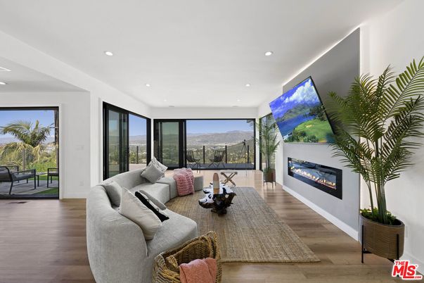 Fireplace, Interior, Living room, Recessed Lighting, Wood Texture Flooring