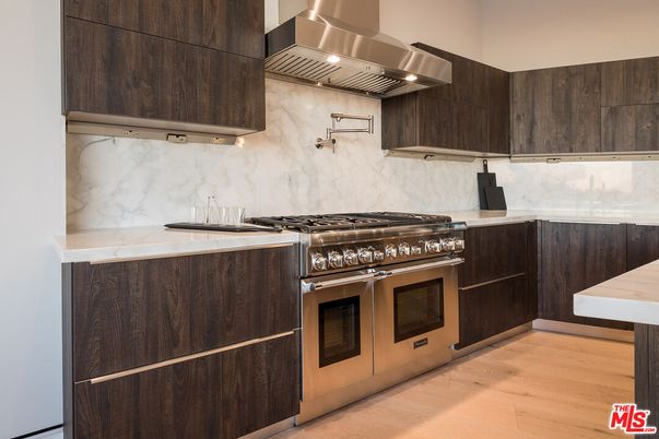 Interior, Kitchen, Marble Walls, Stainless Steel Appliances, Wood Texture Flooring