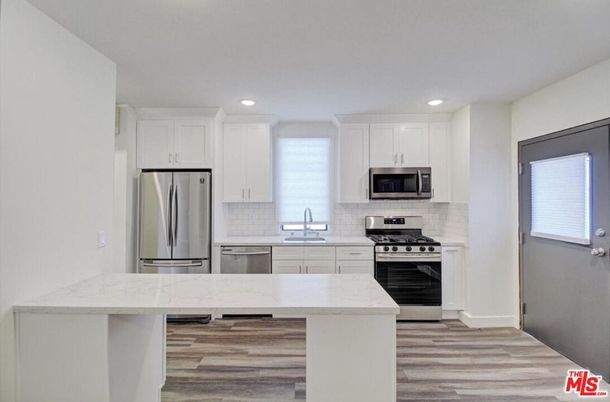 Interior, Kitchen, Recessed Lighting, Stainless Steel Appliances, Wood Texture Flooring