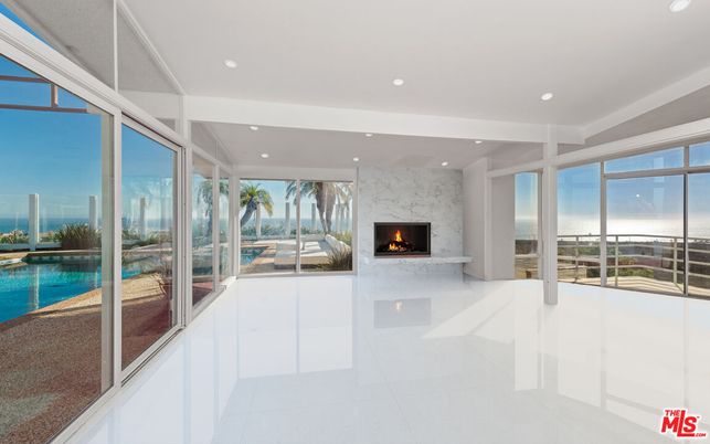 Fireplace, Interior, Marble Walls, Recessed Lighting, Water
