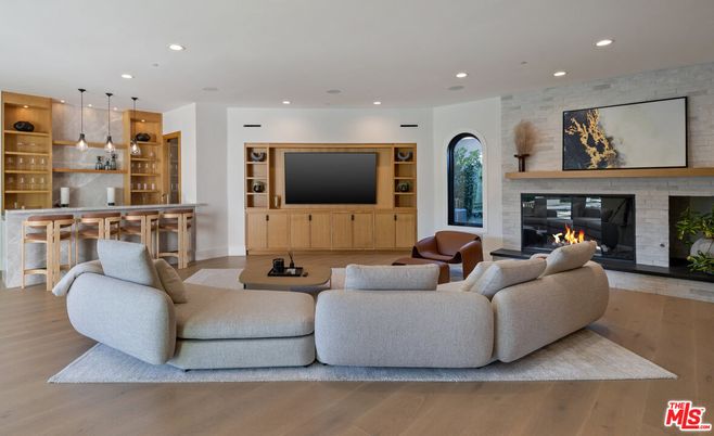 Fireplace, Interior, Living room, Pendant Lights, Recessed Lighting, Stone Walls, Wood Texture Flooring