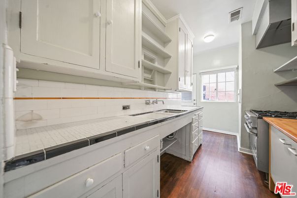 Interior, Kitchen, Tile Countertops, Wood Texture Flooring