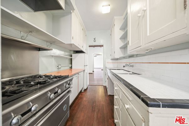 Interior, Kitchen, Tile Countertops, Wood Texture Flooring