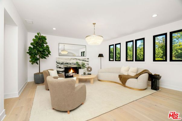 Chandelier, Fireplace, Interior, Living room, Recessed Lighting, Wood Texture Flooring