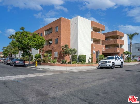 Exterior, Facade, Brick Facade, Condo Building