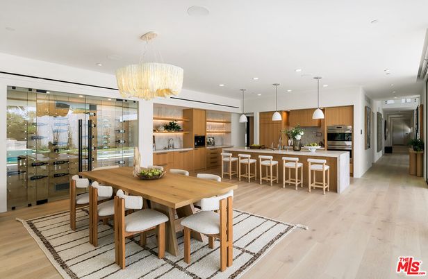 Chandelier, Dining room, Interior, Kitchen, Pendant Lights, Recessed Lighting, Stainless Steel Appliances, Wood Texture Flooring