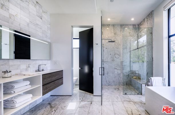 Bathroom, Dual Sink Vanities, Free Standing Baths, Glass Shower, Interior, Marble, Marble Walls, Recessed Lighting
