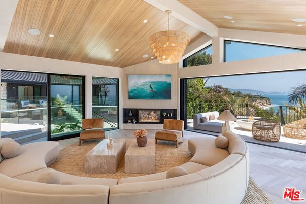 Chandelier, Fireplace, Interior, Living room, Recessed Lighting, Water, Wooden Ceilings, Wood Texture Flooring