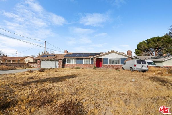 Attached, Exterior, Facade, Solar Panels, Ranch