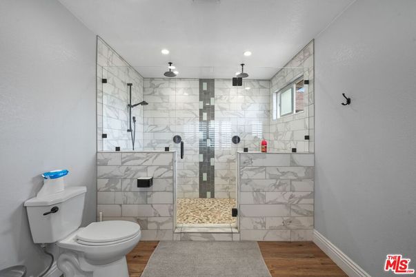 Bathroom, Glass Shower, Interior, Marble Walls, Recessed Lighting, Wood Texture Flooring