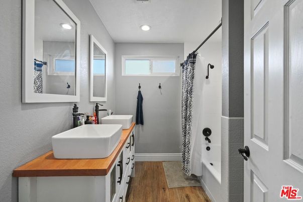 Bathroom, Dual Sink Vanities, Interior, Recessed Lighting, Wood Texture Flooring
