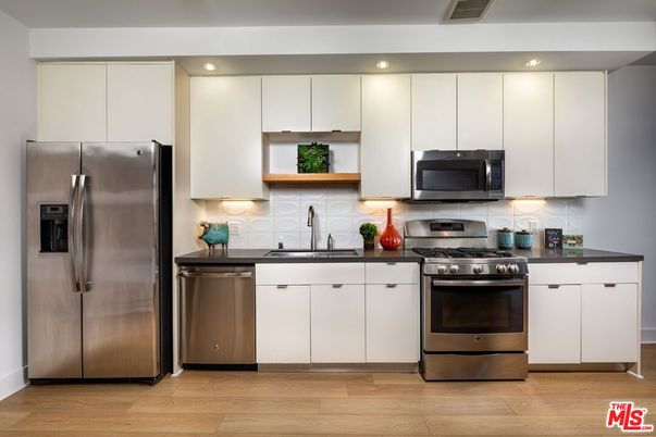 Interior, Kitchen, Recessed Lighting, Stainless Steel Appliances, Wood Texture Flooring