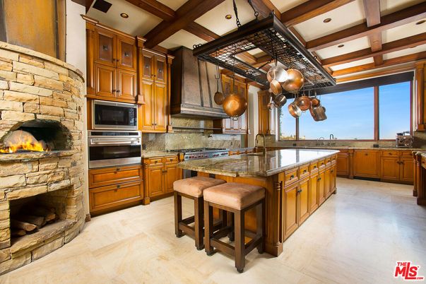 Fireplace, Interior, Kitchen, Recessed Lighting, Stainless Steel Appliances, Stone Walls, Wooden Beams