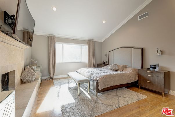Bedroom, Fireplace, Interior, Recessed Lighting, Wood Texture Flooring