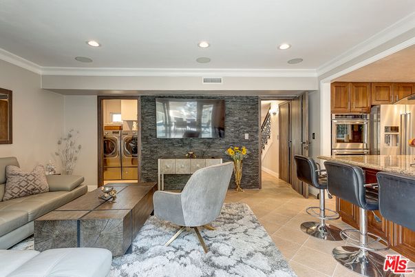 Fireplace, Interior, Kitchen, Living room, Recessed Lighting, Stainless Steel Appliances, Stone Walls