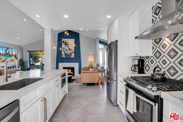 Fireplace, Interior, Kitchen, Living room, Recessed Lighting, Stainless Steel Appliances