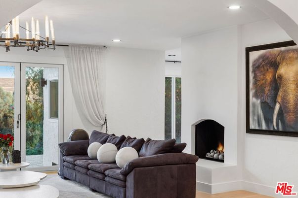 Chandelier, Fireplace, Interior, Living room, Recessed Lighting, Wood Texture Flooring
