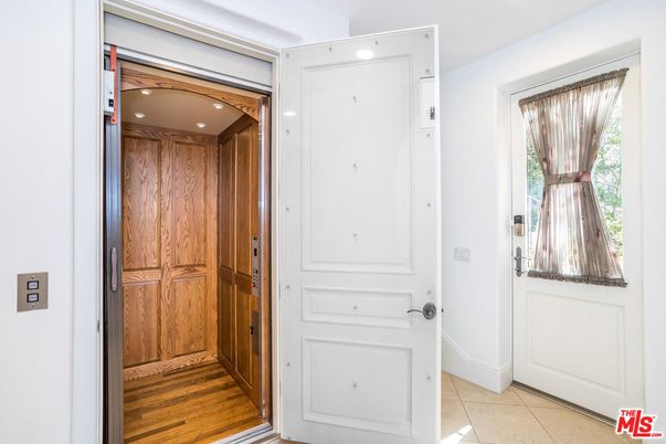 Elevator, Interior, Recessed Lighting, Wood Texture Flooring, Wooden Walls