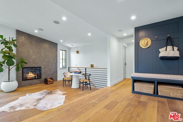 Dining room, Fireplace, Interior, Recessed Lighting, Stone Walls, Wood Texture Flooring