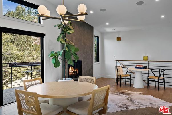 Dining room, Fireplace, Interior, Pendant Lights, Recessed Lighting, Wood Texture Flooring
