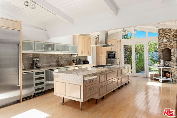 Fireplace, Interior, Kitchen, Stainless Steel Appliances, Stone Walls, Wood Texture Flooring