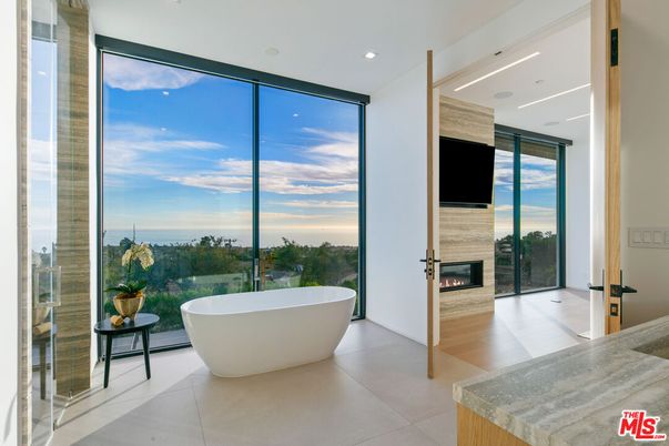 Bathroom, Fireplace, Free Standing Baths, Interior, Recessed Lighting, Wood Texture Flooring