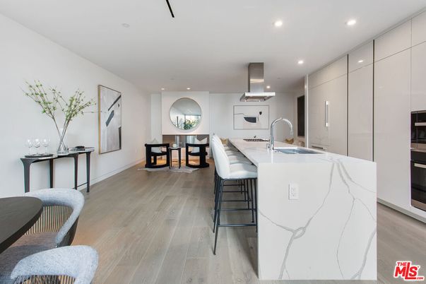 Dining room, Interior, Kitchen, Recessed Lighting, Stainless Steel Appliances, Wood Texture Flooring