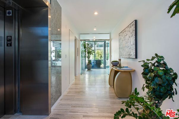 Elevator, Interior, Recessed Lighting, Wood Texture Flooring