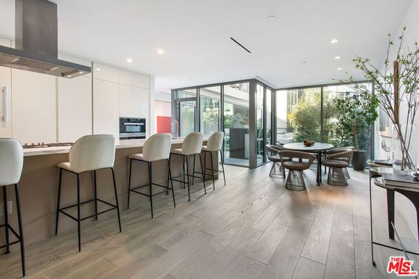 Dining room, Interior, Kitchen, Recessed Lighting, Stainless Steel Appliances, Wood Texture Flooring