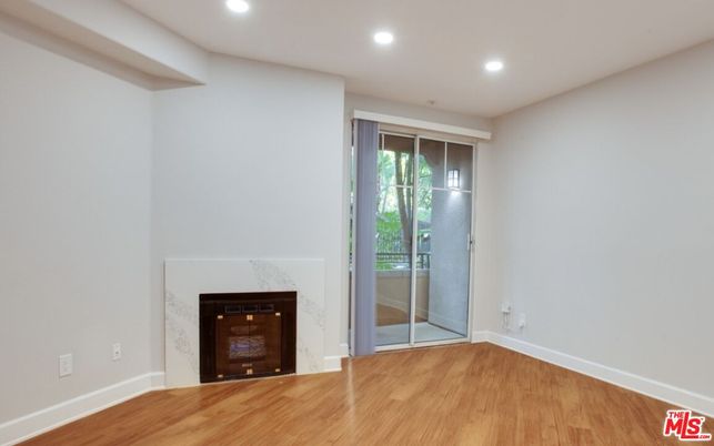 Empty room, Fireplace, Interior, Recessed Lighting, Wood Texture Flooring