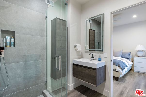 Bathroom, Bedroom, Glass Shower, Interior, Recessed Lighting, Wood Texture Flooring
