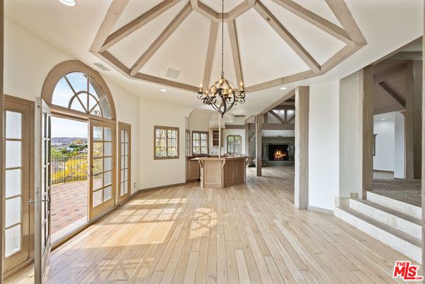 Chandelier, Fireplace, Interior, Recessed Lighting, Wooden Beams, Wood Texture Flooring