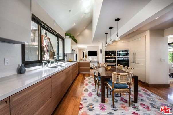 Dining room, Interior, Kitchen, Pendant Lights, Recessed Lighting, Stainless Steel Appliances, Wood Texture Flooring