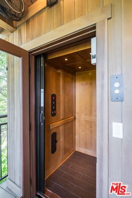 Elevator, Interior, Recessed Lighting, Wooden Ceilings, Wood Texture Flooring, Wooden Walls