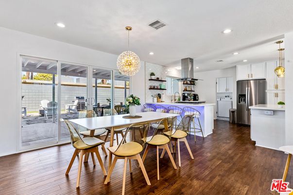 Dining room, Interior, Kitchen, Pendant Lights, Recessed Lighting, Stainless Steel Appliances, Wood Texture Flooring