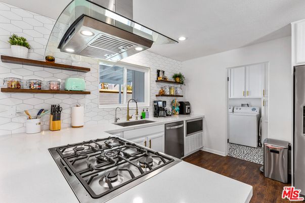 Interior, Kitchen, Recessed Lighting, Stainless Steel Appliances, Washer, Wood Texture Flooring