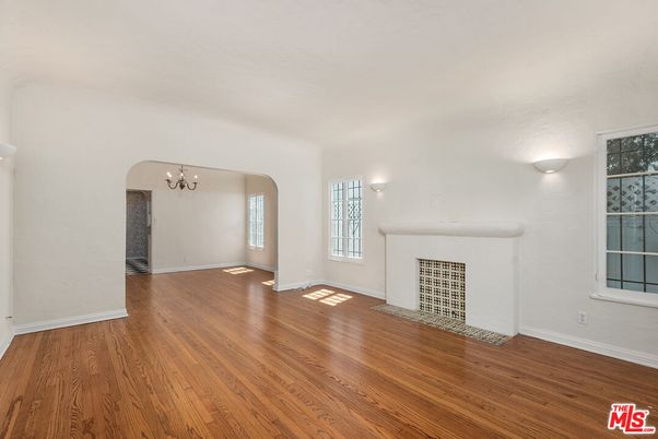 Chandelier, Empty room, Fireplace, Interior, Wood Texture Flooring