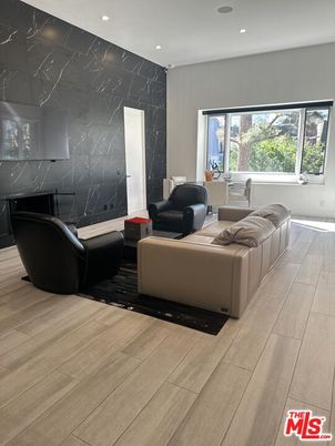 Interior, Living room, Marble Walls, Recessed Lighting, Wood Texture Flooring