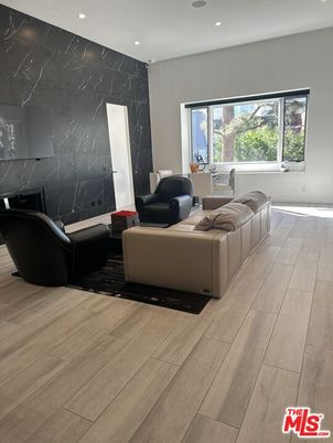 Interior, Living room, Marble Walls, Recessed Lighting, Wood Texture Flooring