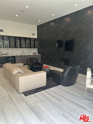Interior, Living room, Marble Walls, Recessed Lighting, Wood Texture Flooring
