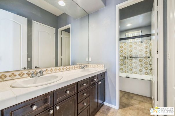 Bathroom, Dual Sink Vanities, Glass Shower, Interior, Recessed Lighting, Tile Countertops