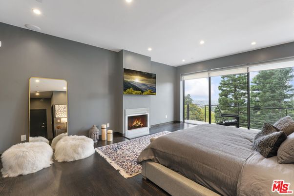 Bedroom, Fireplace, Interior, Recessed Lighting, Wood Texture Flooring